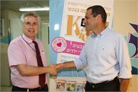 עודד פרנקל ופרופסור אשר ברזילי. צילום אסף לב