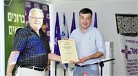 סייד קשוע מקבל את פרס כנרת מנשיא המכללה האקדמית כנרת