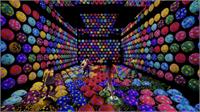 teamLab, Rapidly Rotating Bouncing Spheres in the Caterpillar House (c) teamLab