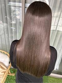 החלקה לשיער חום כהה